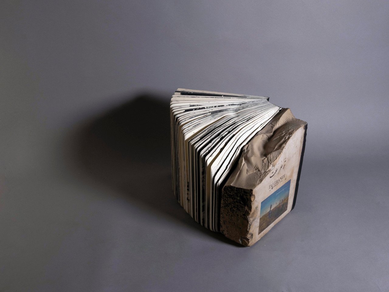 J'ai grandi — detail of the stone book by Ali Arkady.