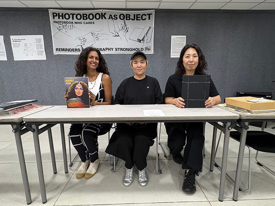 Sheetal Mallar, Yumi Goto and Tamaki Yoshida posing for a group picture during The Book Walks On.