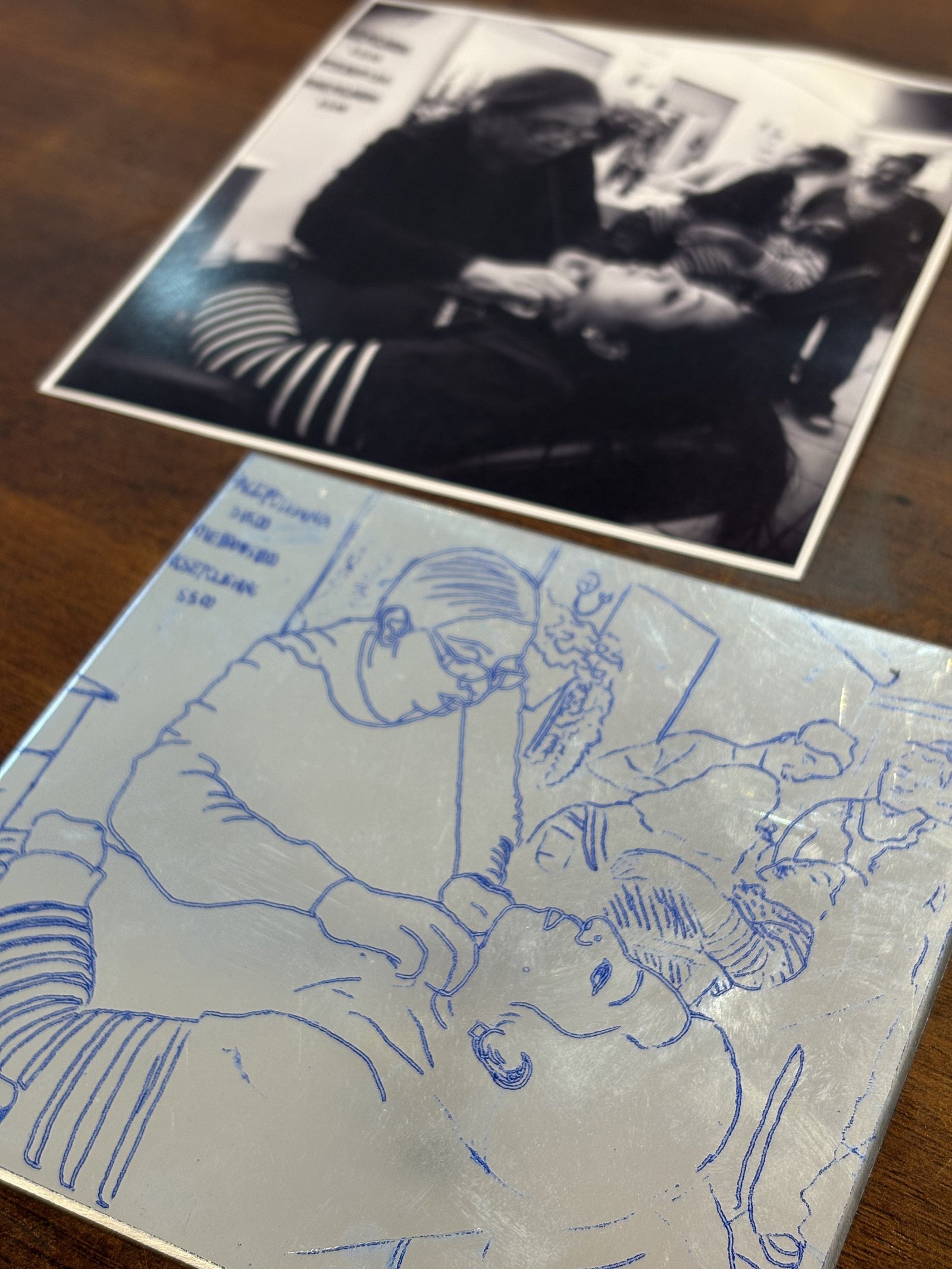 A drawing on an etching plate, referenced from a photograph made in New York.