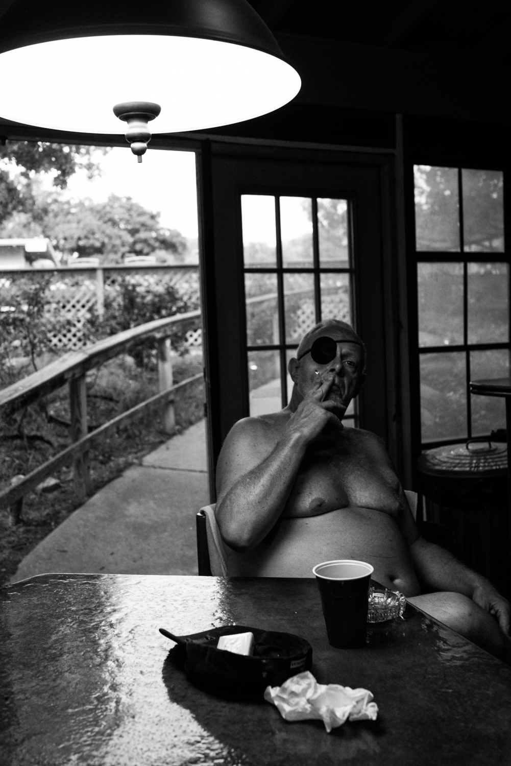 Man at a nudist colony, Interior, Texas