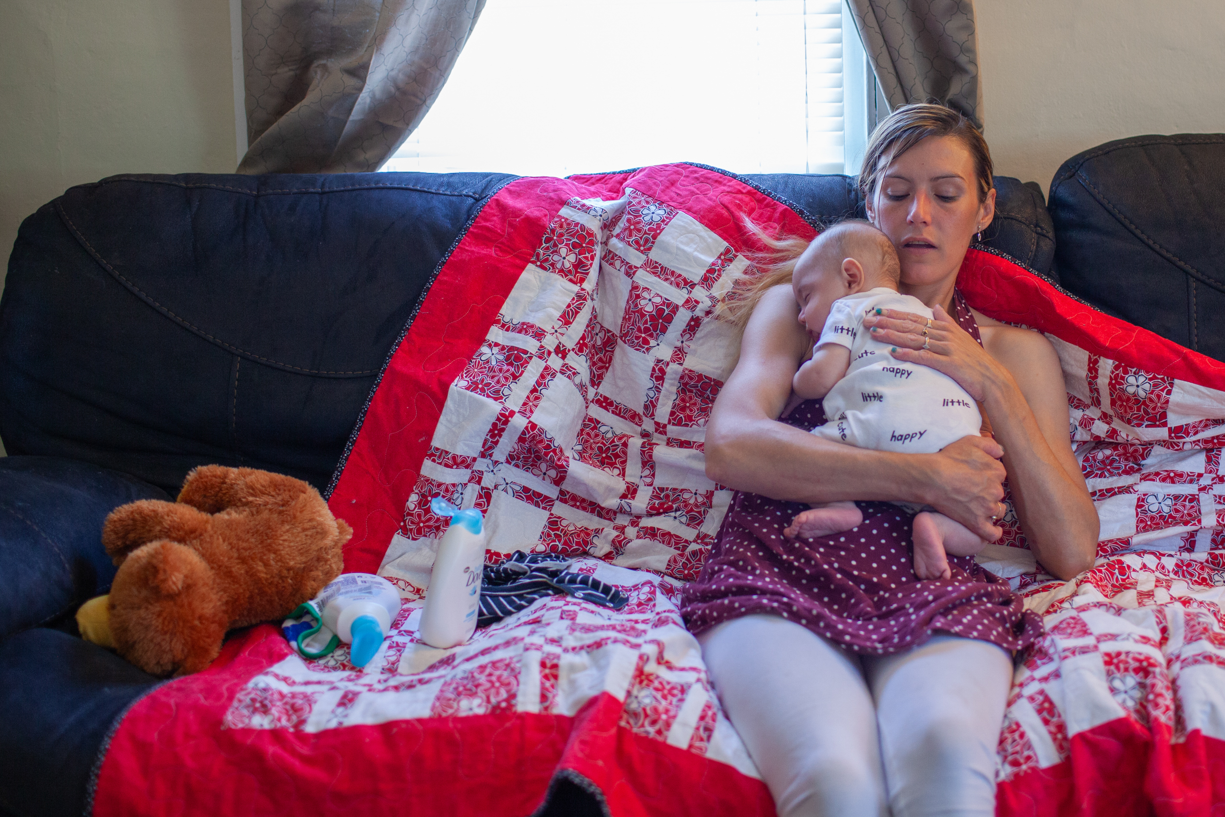 Cary holding her newborn son Jay