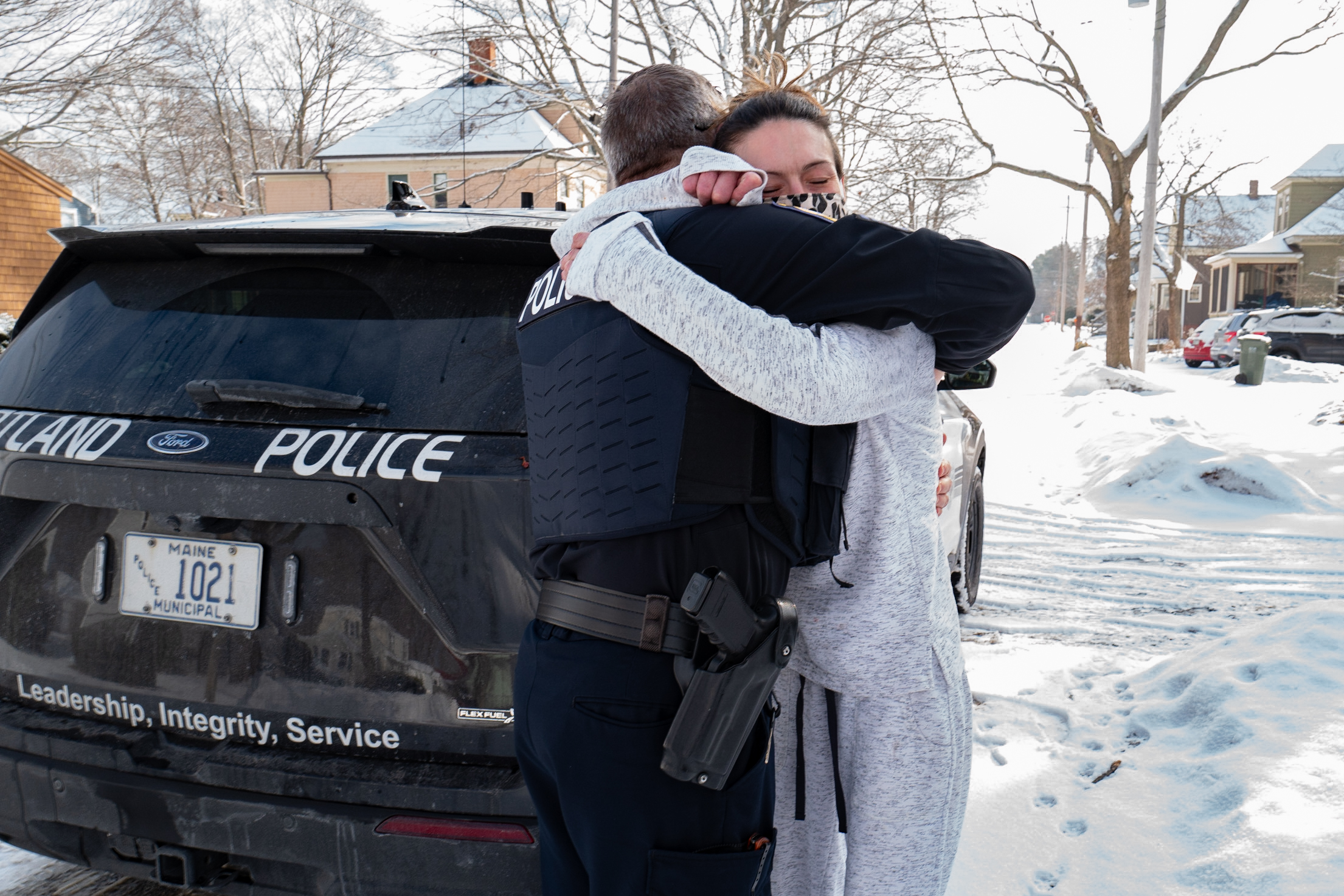 Cary embracing Sgt. Tim Farris